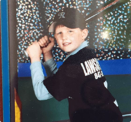Peter Gustafson playing little league baseball in Chicago, IL